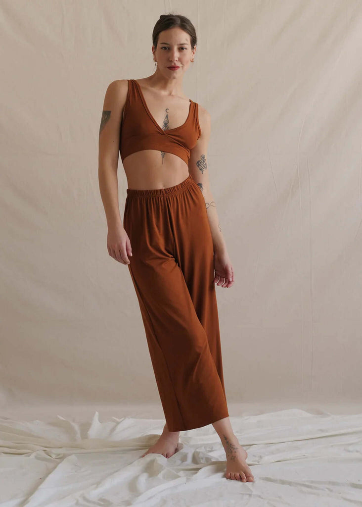 Woman wearing Tender Pants in caramel, loose fit with elastic waist — MYFASHIONFRUIT