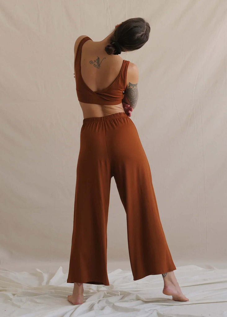 Woman wearing Tender Pants, caramel color soft-touch fabric, relaxed fit — MYFASHIONFRUIT