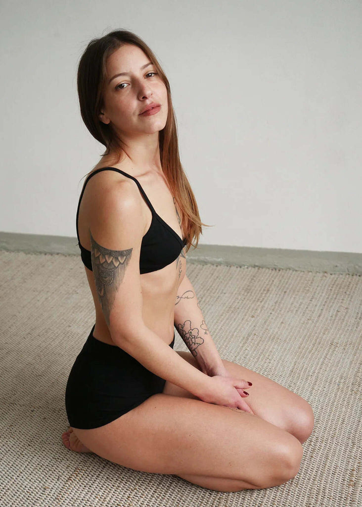 Woman wearing a black Fierce Bralette and high-waisted bottoms — MYFASHIONFRUIT
