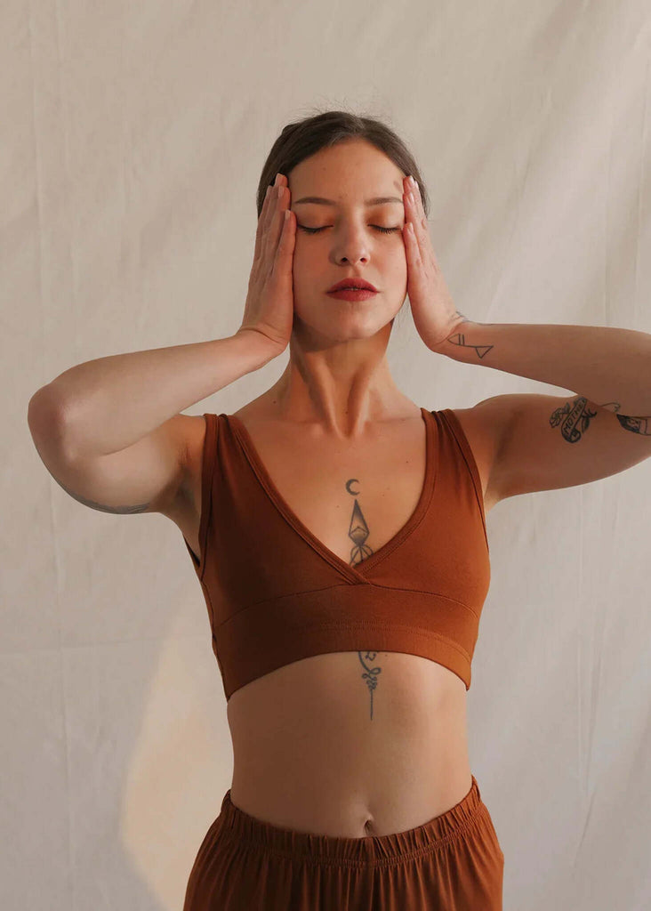 Woman wearing a caramel Soft Bralette with V neck and elastic band — MYFASHIONFRUIT