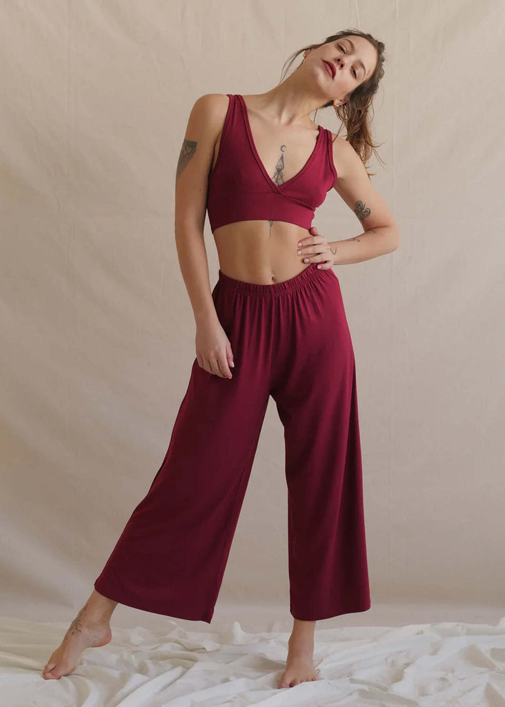 Woman wearing Tender Pants, sour cherry color, relaxed fit — MYFASHIONFRUIT