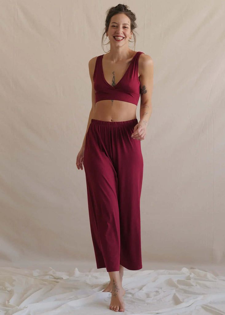 Woman wearing a sour cherry Tender Pant and matching bra top set — MYFASHIONFRUIT