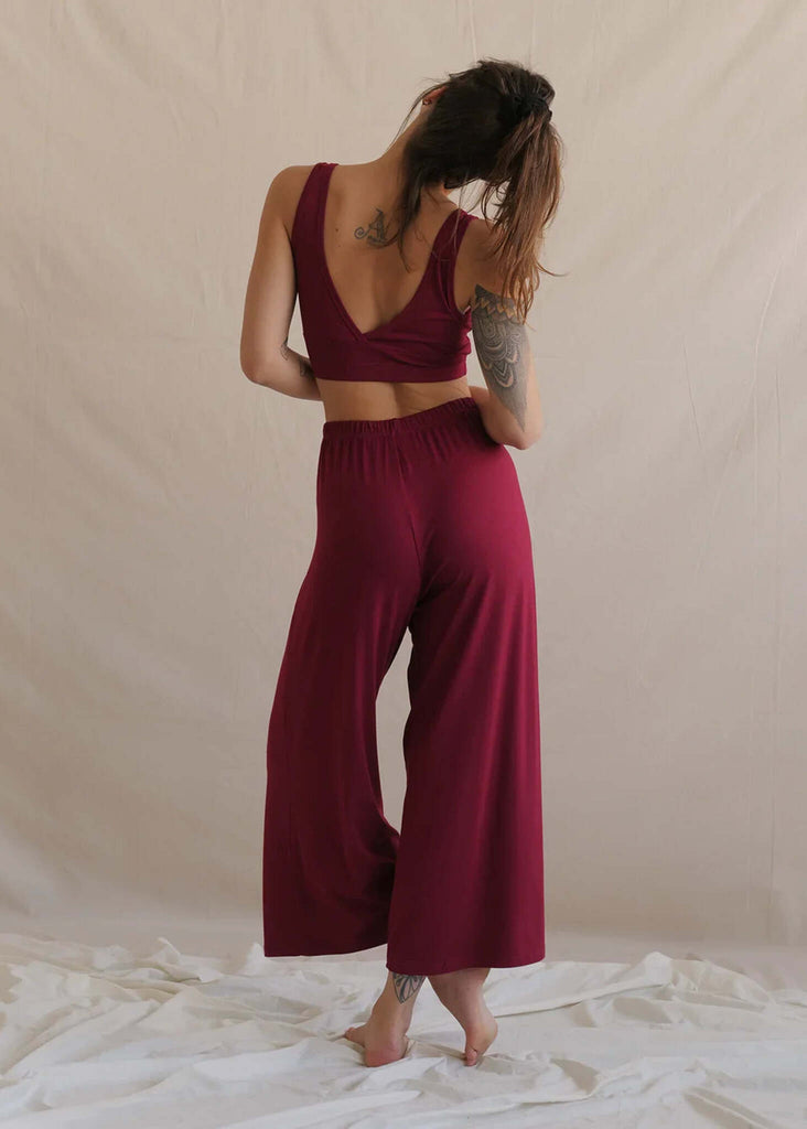 Woman wearing Tender Pants — cherry red palazzo pants and crop top set — MYFASHIONFRUIT