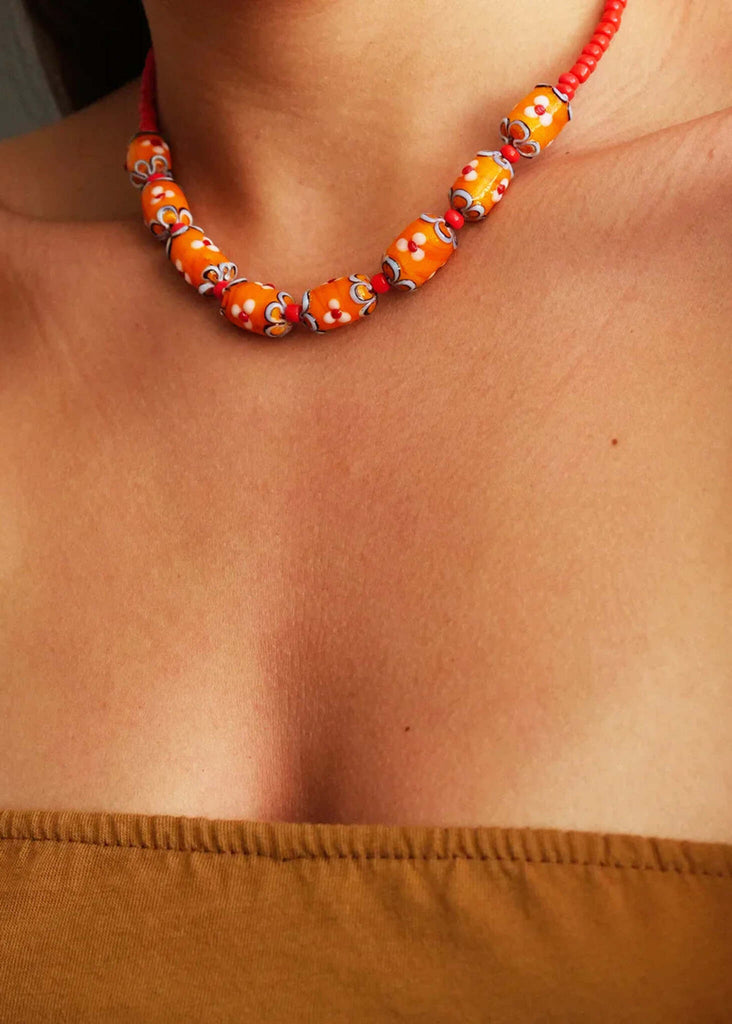 Helia Necklace — orange beaded necklace on model — MYFASHIONFRUIT