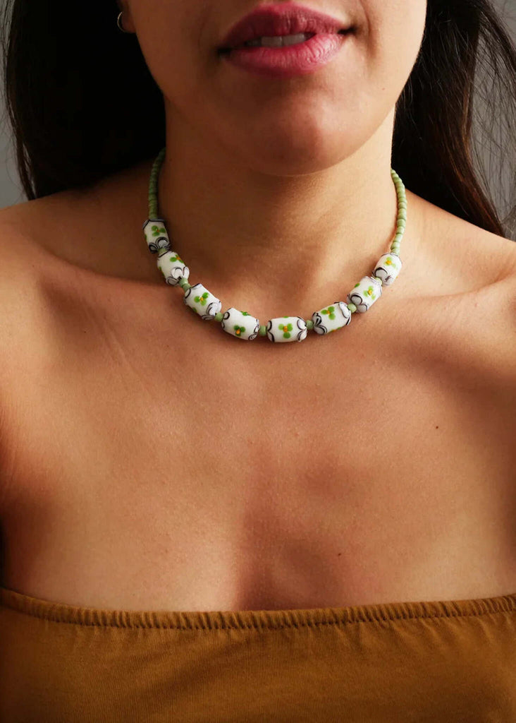 Helia Necklace — White floral beaded necklace on model — MYFASHIONFRUIT