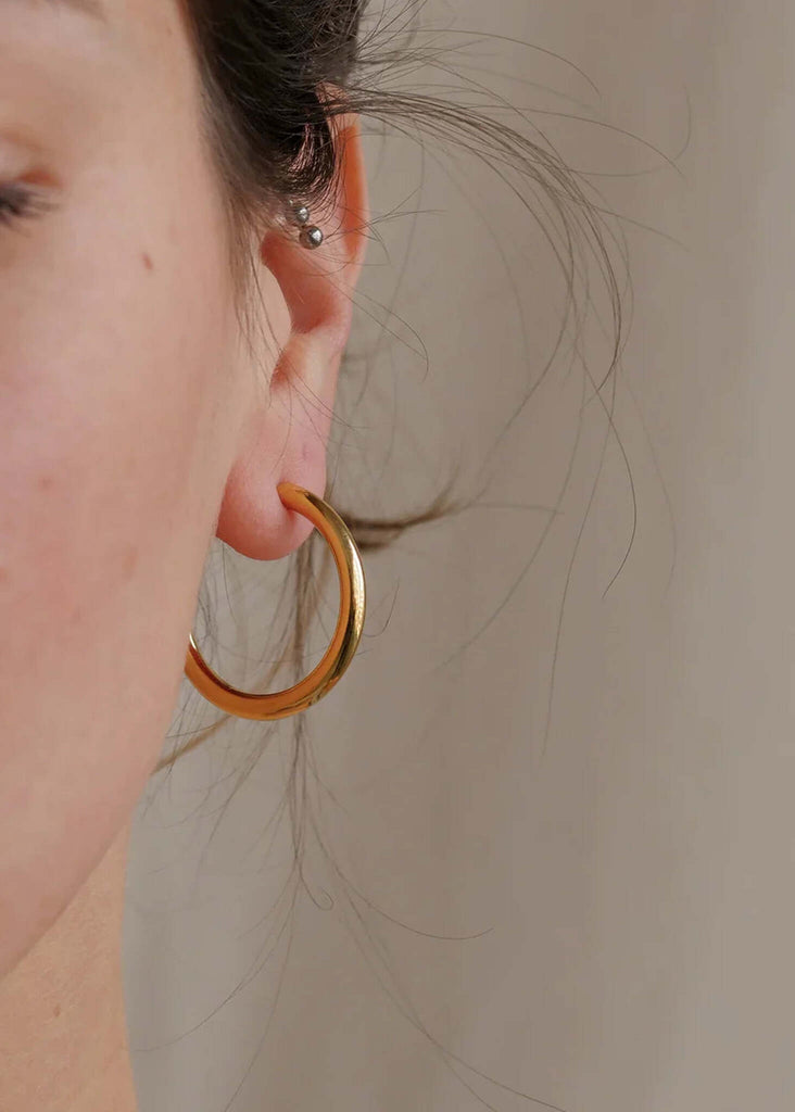Susie Hoops — Gold hoop earring on ear — MYFASHIONFRUIT