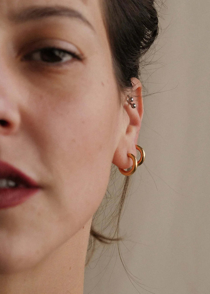 Nikki Hoops — Model wearing gold hoops — MYFASHIONFRUIT