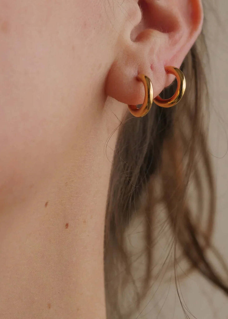 Nikki Hoops — Gold hoops on ear— MYFASHIONFRUIT