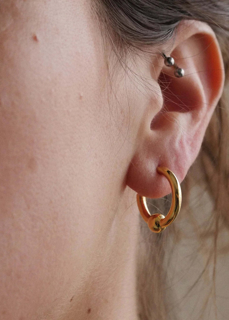 Peg Hoops — Gold earring with knot detail — MYFASHIONFRUIT