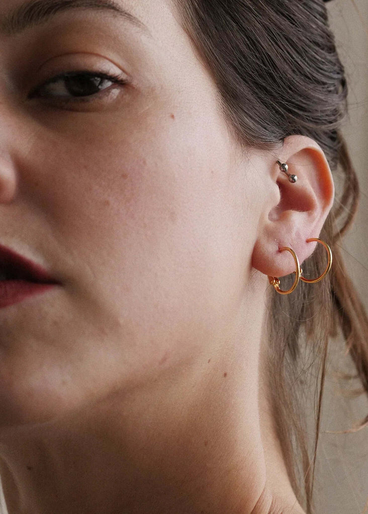 Lola Hoops — Detail shot, model wearing small gold hoops — MYFASHIONFRUIT