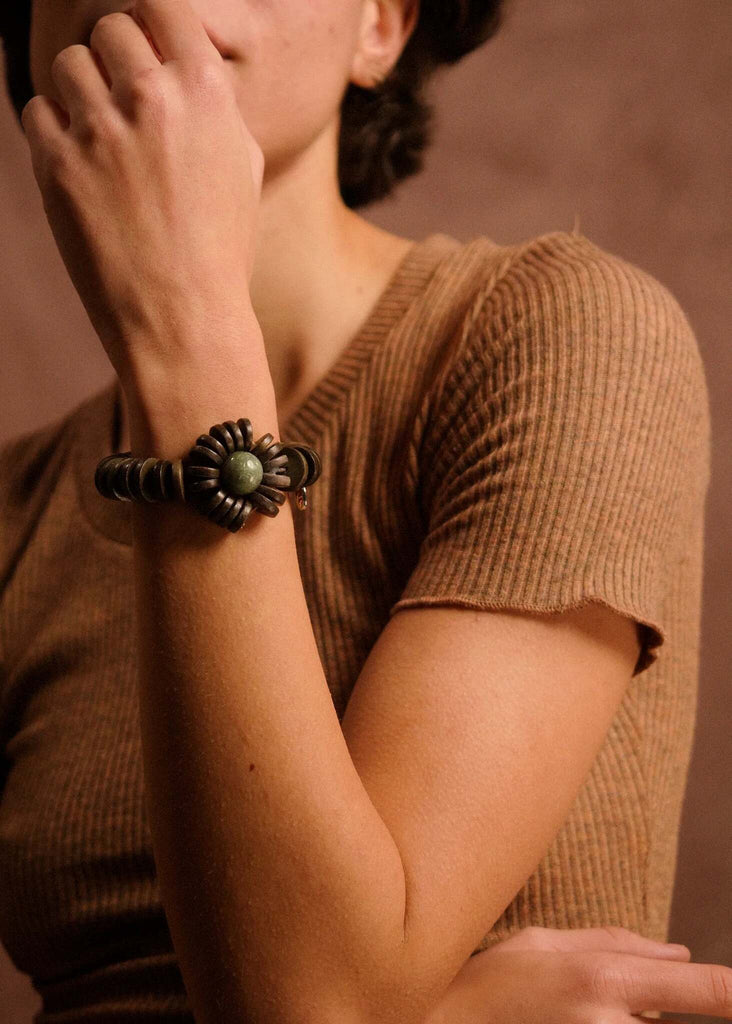 Rolla Bracelet — On model, black flower w/ green stone — MYFASHIONFRUIT