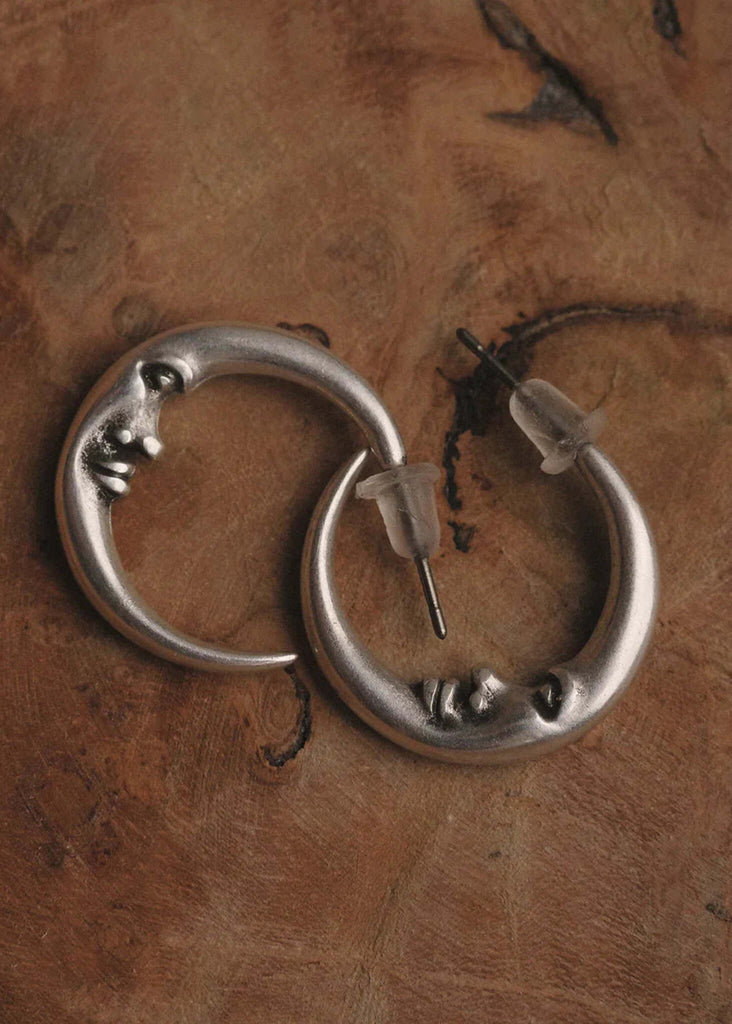 Cynthia Hoops — Silver moon earrings on wood — MYFASHIONFRUIT