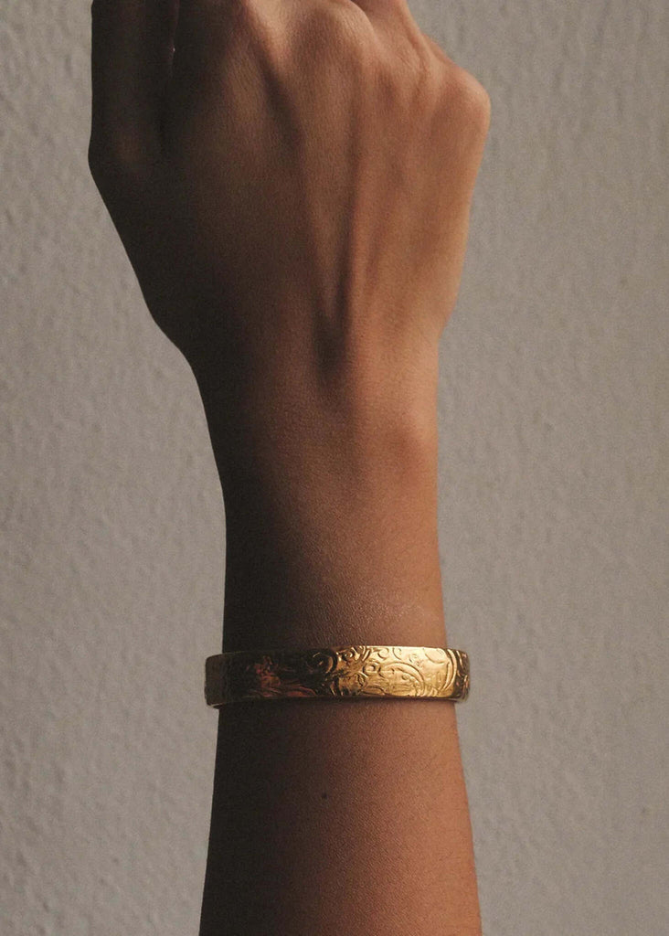 Treasure Cuff — gold tone ornate cuff bracelet on wrist — MYFASHIONFRUIT