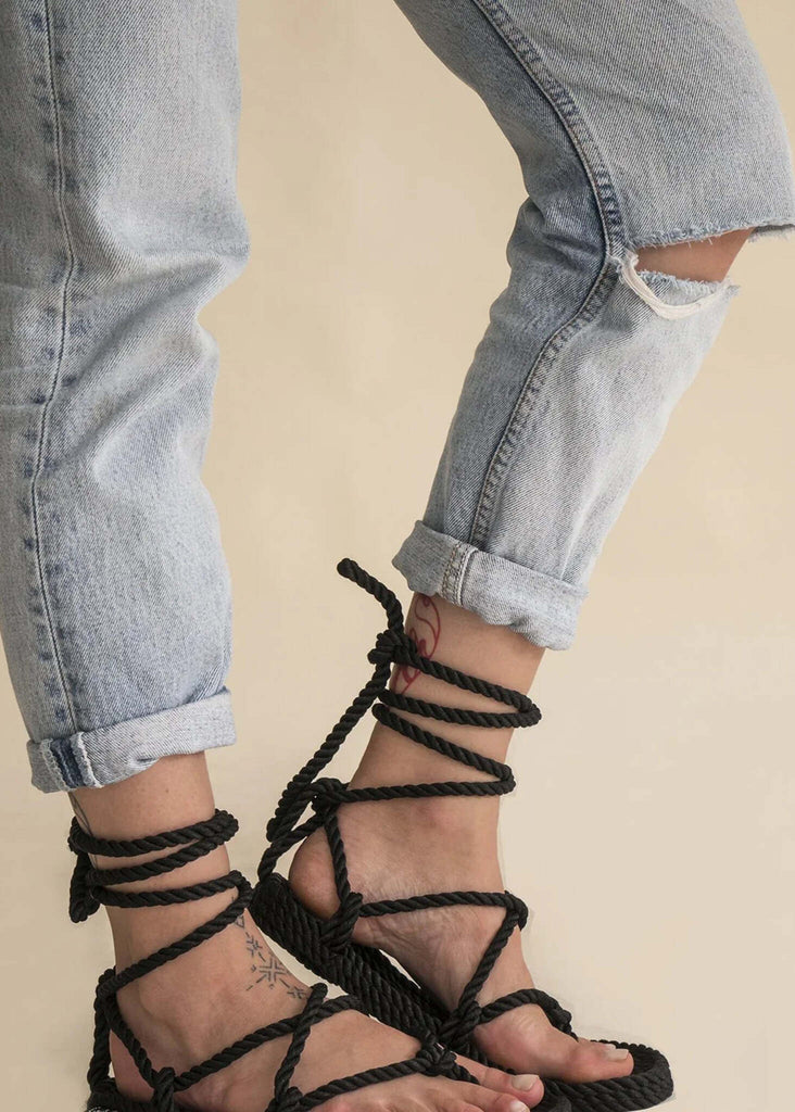 Woman wearing light blue jeans and Romano Black Sandals with rope laces — MYFASHIONFRUIT