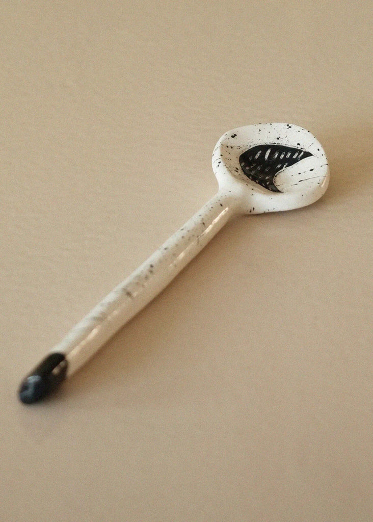 The Moon Spoon — white ceramic spoon with black moon detail — MYFASHIONFRUIT