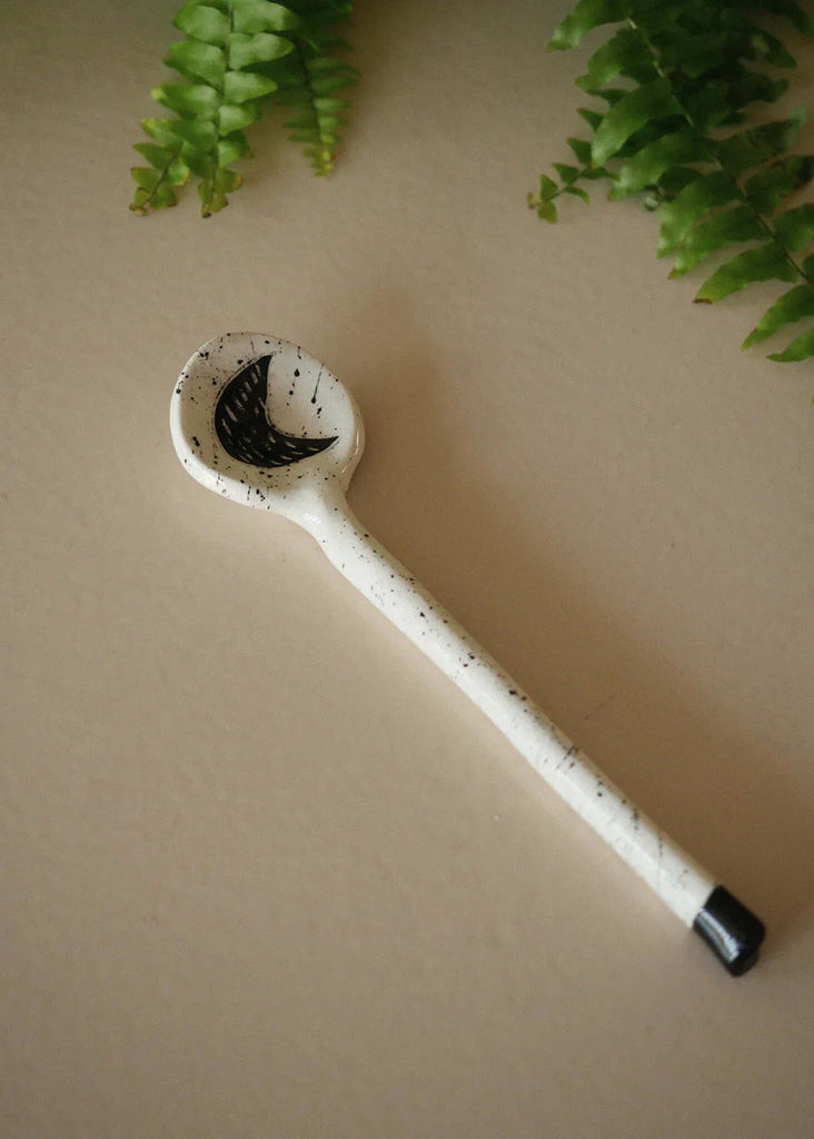 The Moon Spoon — white ceramic spoon with black moon detail — MYFASHIONFRUIT