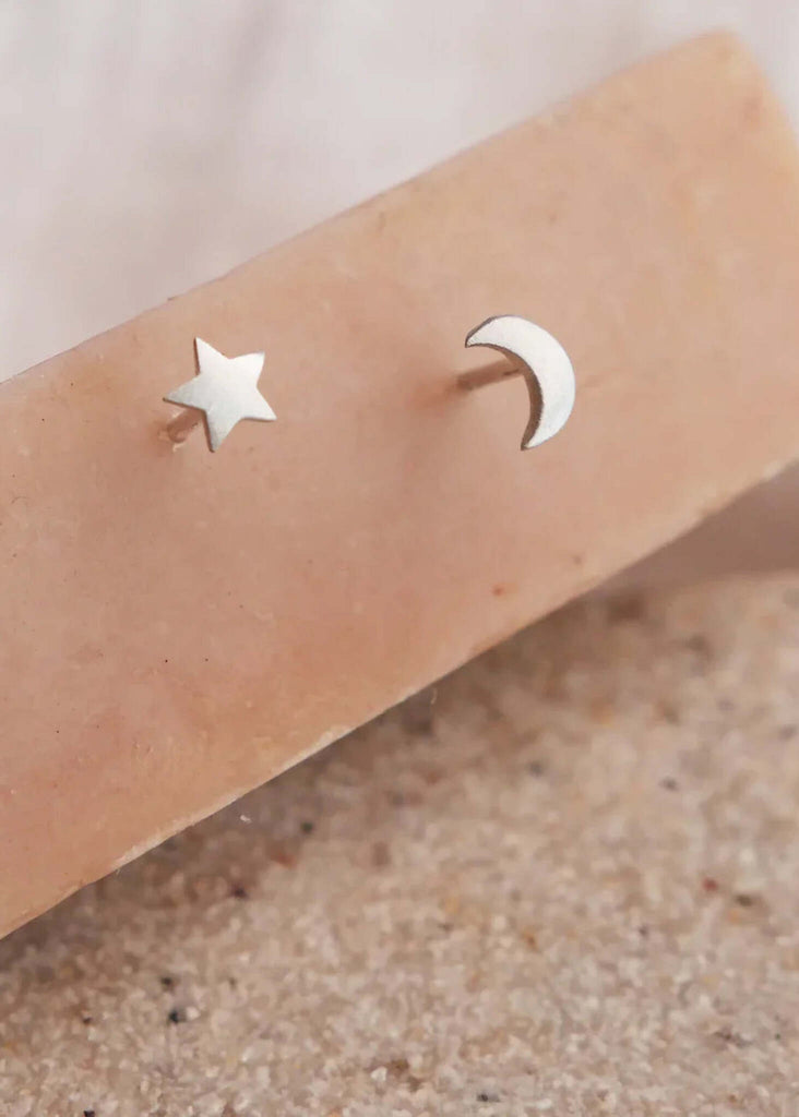 Moon & Star Earrings — silver star and moon stud earrings detail — MYFASHIONFRUIT